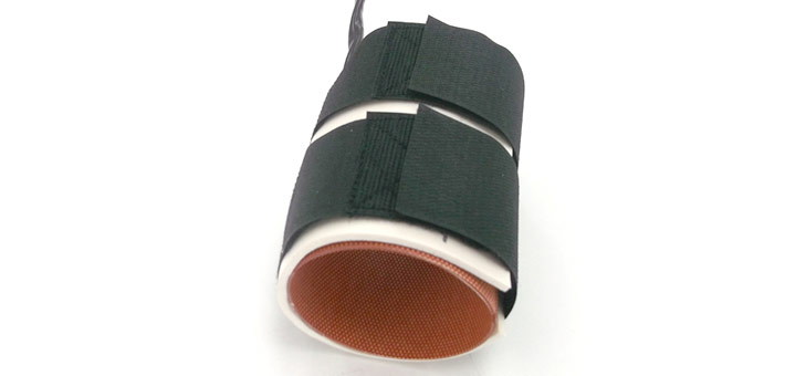 Silicone heater for a tube with silicone foam and velcro, closed