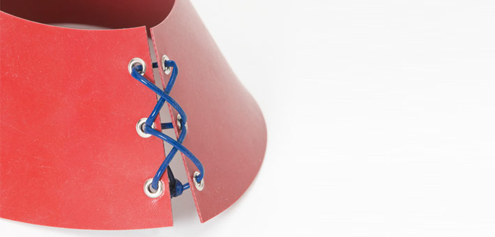 Silicone heater for conical shape, stretched over eyelets