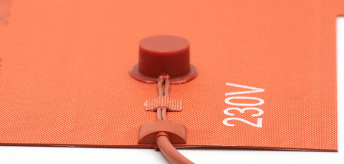 Detail silicone heater with limiter 1/2" disk and termination area with silicone cable